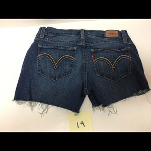 Levi’s 524 cut off jeans raw hem